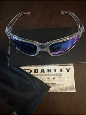 Oakley Clear Frame Prism Sapphire Iridium Sunglasses